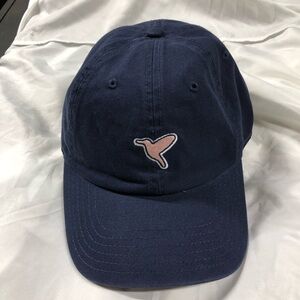 Bird Dog baseball hat. The back says free the bird